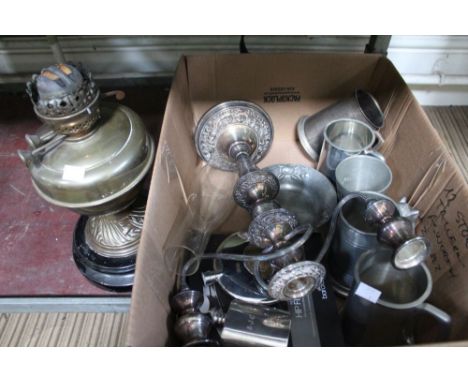 A box containing a selection of silver plate together with a lamp