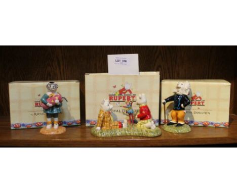 Three Royal Doulton "Rupert" ceramic figurines, includes "The Imp of Spring", each in original boxes (3)