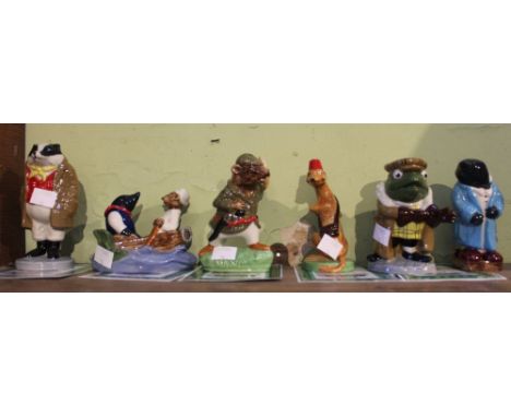 A collection of six Wade "Wind in the Willows" ceramic figures with boxes and certificates