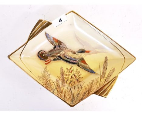 An Art Deco Carlton ware bowl decorated with a duck in flight, L. 30cm. W. 23cm.