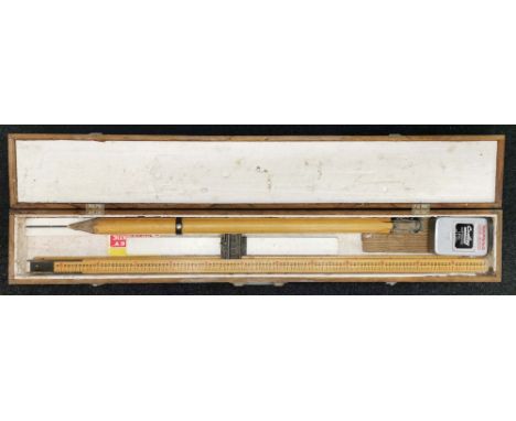 A vintage pine cased surveyors theodolite level and gauge, case L. 136cm.