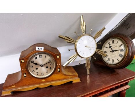 A mother of pearl inlaid mantle clock, 45 x 24cm. together with two further clocks.
