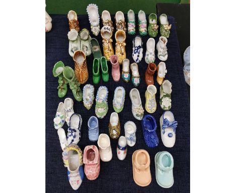A group of approximately 50 19th and early 20th Century ceramic shoes.
