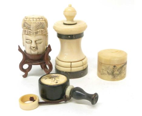 Group of ivories including carved head, small ivory pill box with decoration of lady amongst clouds, vintage ivory belt, buck