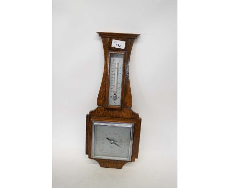Early 20th century oak cased aneroid barometer and thermometer combination