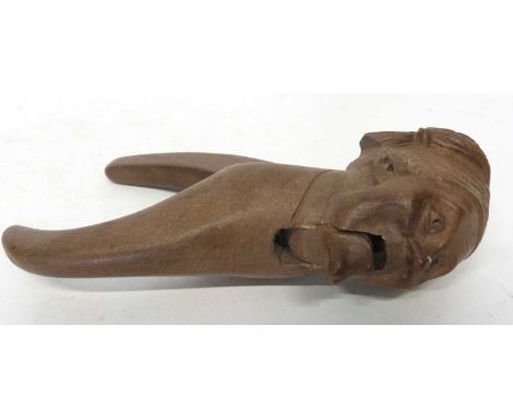 Late 19th century figural wooden nutcracker carved as a French peasant