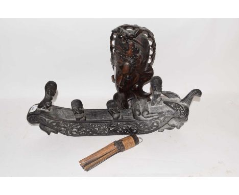 Tribal/ethnographica interest - a mixed lot comprising a hanging Batak calendar, an Indonesian carved wooden boat with figure