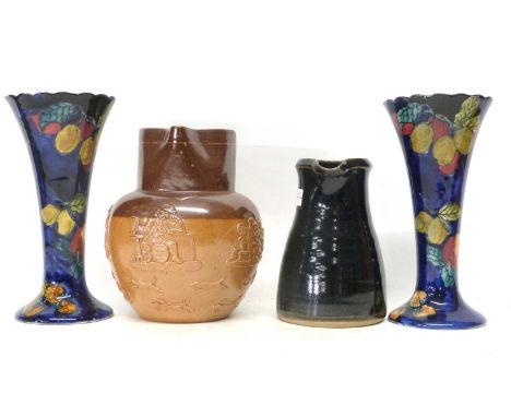 Pair of Titian ware trumpet vases by Hancock &amp; Sons, together with a Doulton Harvest jug and further Art pottery jug with