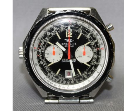 Uhren. Breitling “Navitimer Chronomatic“. Armbanduhr mit rundem Gehäuse und Metallarmband. Zifferblatt mit Firmenname "Breitl