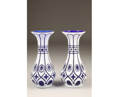 Pair of bohemian white overlay blue flash cut glass vases, of baluster form, 32cm high.CONDITION REPORT:Slight chip to rim, a