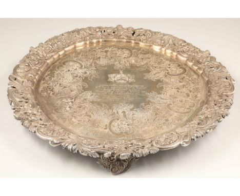 A magnificent William IV silver circular tray, with a pierced floral and c scroll border with prominent thistle heads. Centre
