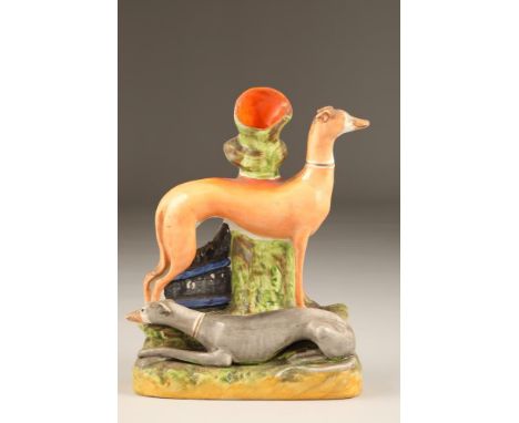 19th century Staffordshire pottery greyhound spill vase, height 28cm. CONDITION REPORT:Chip of right hand ear.