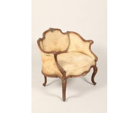 19th century French carved walnut bergère chair, raised on carved cabriole legs with acanthus leaf knees, 70cm wide, 60cm dee