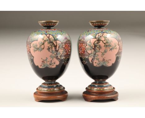 Pair Japanese cloisonne vases, baluster form, dark blue ground with panels of wisteria and other flowering trees and birds, M