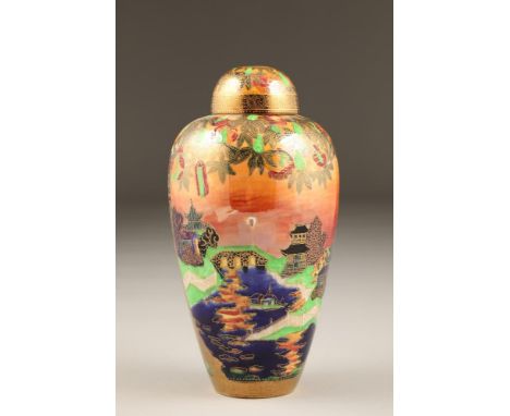 Wedgwood Fairyland lustre vase and cover, by Daisy Makeig-Jones, decorated in the 'Willow' pattern, the scene framed by tree 