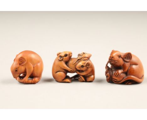 Five Japanese carved fruitwood animal netsuke, all signed including a swan, a monkey clutching a pumpkin, a mouse holding his