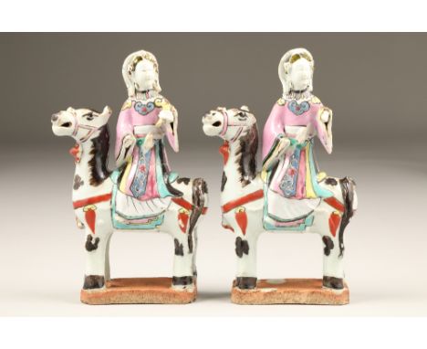Pair 19th century Chinese pottery, figures on horseback (damages), height 21.5cm.CONDITION REPORT:The pair of Chinese figures