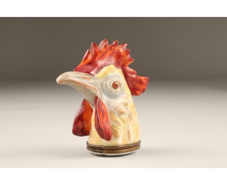 19th/20th century ceramic snuff box, modelled on a cockerels head, 10cm high.CONDITION REPORT:Overall in good condition.