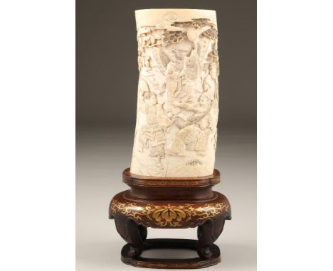 Finely carved 19th century Japanese ivory tusk vase, carved figures including samurai warriors amongst trees, signed, Meiji p