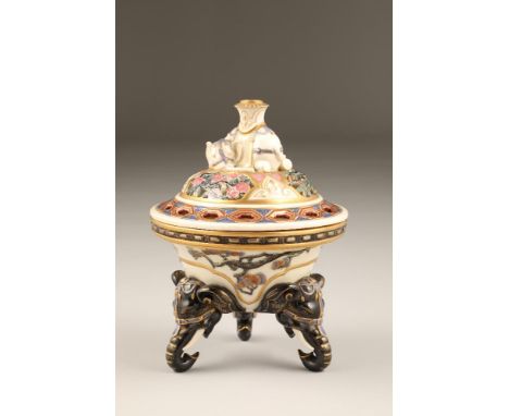 Royal Worcester pot pourri dish and cover, decorated with bamboo shoots and oriental pines, raised on three elephant heads st