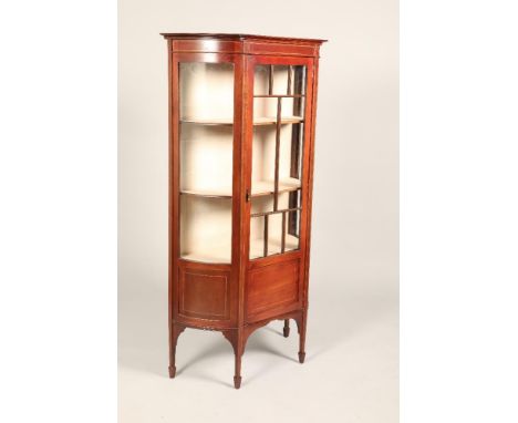 Edwardian inlaid mahogany display cabinet, central glazed door with glass bow shaped sides, raised on square tapered legs and