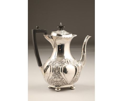 Art nouveau four piece silver tea and coffee service, embossed stylised flowers and leaves, raised on bun feet, including tea