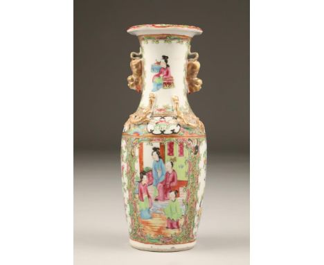 19th century Chinese canton vase, of baluster form with applied gilt buddha dogs and gilt dragons. Vase decorated with figure