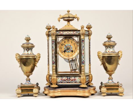 19th century French gilt metal and champleve enamel three piece clock garniture, hexagonal glass case with circular gilt dial