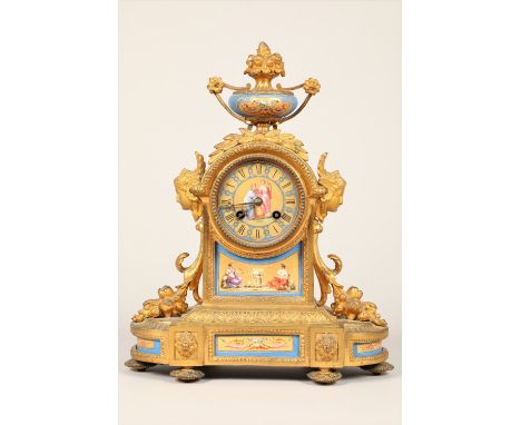 19th century French gilt metal and porcelain mantle clock, decorated with hand painted neo classical figures, 8 day movement,