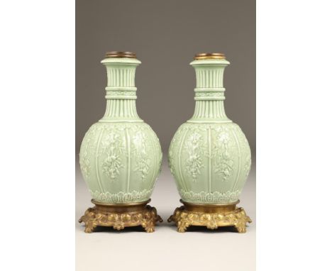 Pair of French porcelain table lamp bases, 34cm high.Condition Report:Overall in good condition