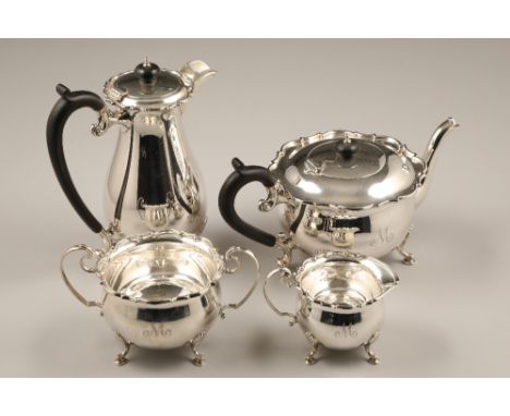 Four piece silver tea service, comprising of coffee pot, tea pot, sugar and cream, assay marked Birmingham 1933, 1679g.
