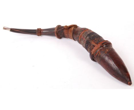 An early 20th African possibly&nbsp;Mangbetu gun powder flask / horn made from African cow horn adorned with leather, weaved 