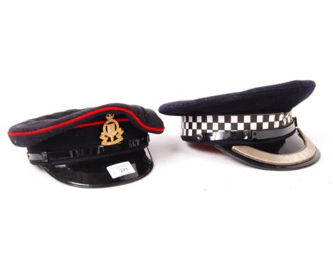 A vintage British issue RAOC Royal Army Ordnance Corps uniform peaked cap - retaining the original badge to front. Size No. 5