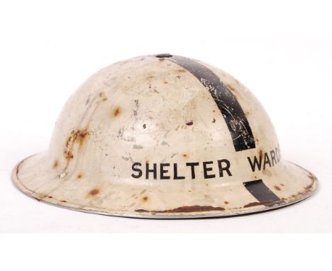 A rare (possibly London Transport issued ) WWII Second World War ARP Air Raid Precautions ' Shelter Warden ' steel brodie uni