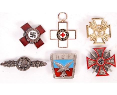 A collection of 6x WWII Second World War related German military badges and awards - many with enamel decoration. To include;