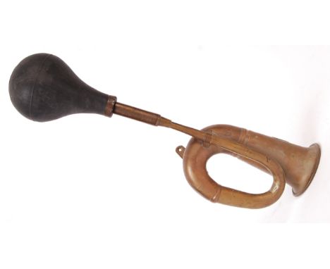 A vintage early 20th century ' Deluxe ' brass car horn. Complete with it's original rubber pump. Stamped ' Deluxe ' to body. 