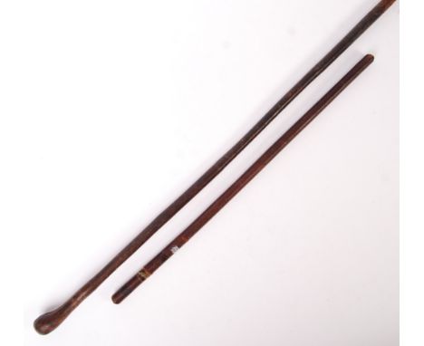 Two antique / vintage likely late 19th / early 20th century WWI First World War swagger / walking stick canes. The first bein