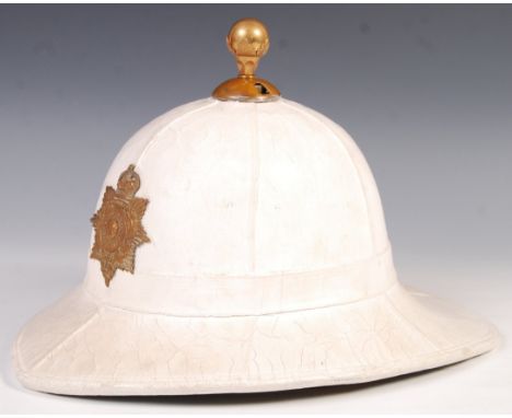 An original 20th century Royal Marines pith / topee helmet. Queen's Crown badge to front, complete with inner liner and chin 