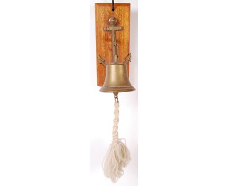 A WWI First World War interest later-issue brass bell inscribed for ' MS Bremen 1911 '. Mounted on a wooden plaque, with an a