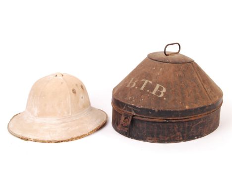 An original WWI First World War period ' Ellwood's Cork Helmet ' Pith Helmet - initialled ' B.T.B '. Helmet AF (worn). Suppli