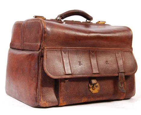 A beautiful early 20th century leather Gladstone bag by Insall of Bristol. High quality, the bag opens to reveal a fitted int