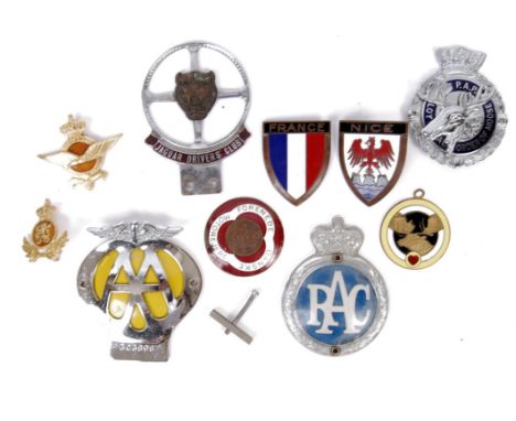 A collection of 8x vintage enamel car insignias to include; AA, RAC, 2x PAP Loyal Order Of, The Moose, France shield, Nice sh