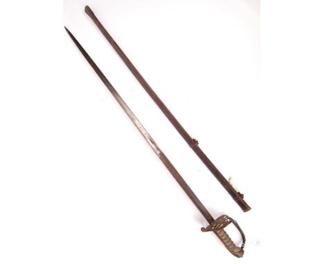 A 19th century Victorian British light infantry officers sword having a brass half basket hilt with the VR cipher and shark s