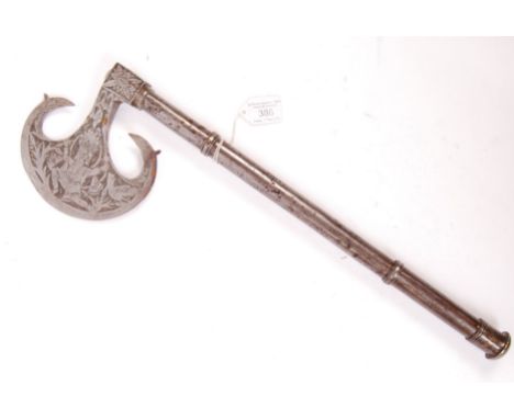An unusual believed late 19th to early 20th century decorative Mughal type Indian (Sind) Tabar battle axe having a crescent a