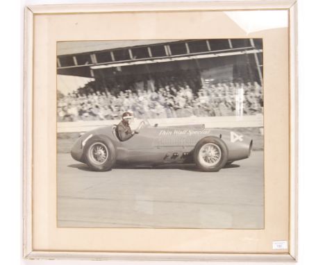 A rare vintage 1956 Monaco Grand Prix large format black and white photograph, depicting a Ferrari Thin Wall Special racing c