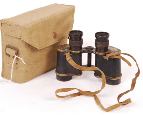 A pair of WWII Second World War Taylor Hobson made x6 field binoculars. Graticules to lens, date stamped for 1941. Within its