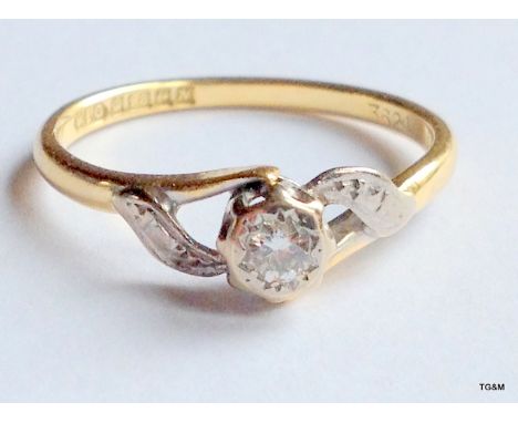 An 18ct gold diamond ring size P