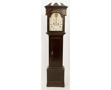 GEORGE III LONGCASE CLOCK the arched painted Roman/Arabic dial with seconds and curved date aperture and painted with an oval