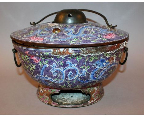 AN UNUSUAL 19TH CENTURY CHINESE CANTON ENAMEL HOT FOOD BOWL & COVER, with central metal warmer, the cover and sides with swin