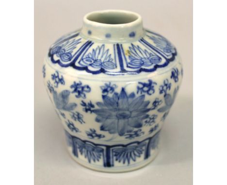 A SMALL CHINESE BLUE & WHITE PORCELAIN JAR, the sides decorated with scroll-stemmed flowerheads between floral lappet borders